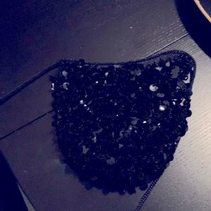 Cross body dressy bag with sequins.